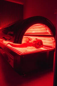 Man sleeping in a red light therapy machine Man sleeping in a red light therapy machine